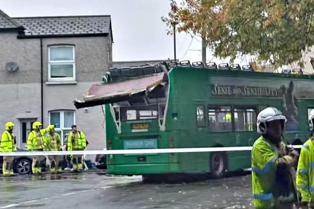 Three children taken to hospital after school bus hits railway bridge in Newport
