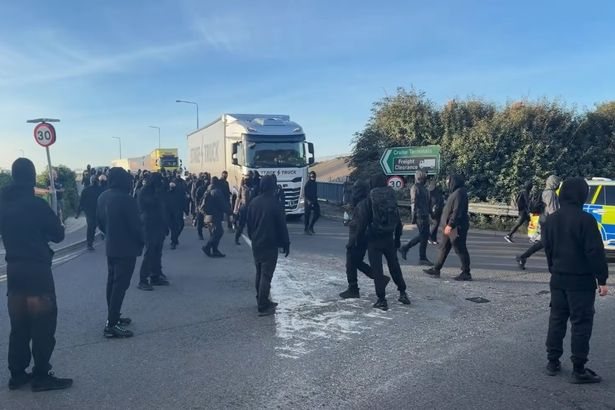 Masked protesters block access to Port of Dover and A20