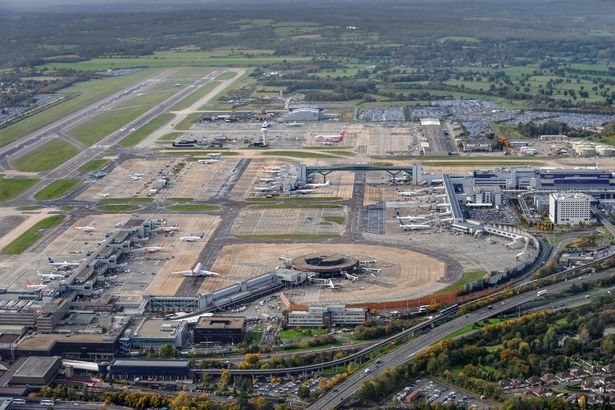 Man arrested on suspicion of arson after fire destroys cars at Gatwick Airport parking site