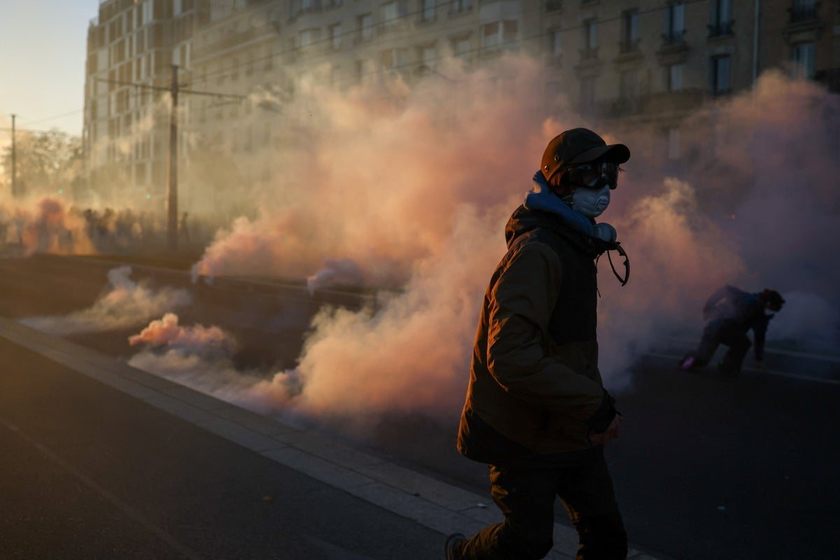 Police clash with masked rioters as France's protests turn violent